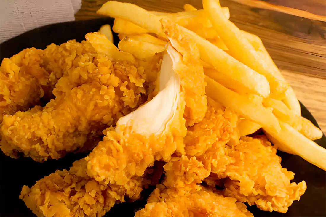 Close-up of crispy chicken wings, highlighting the perfect texture after reheating"