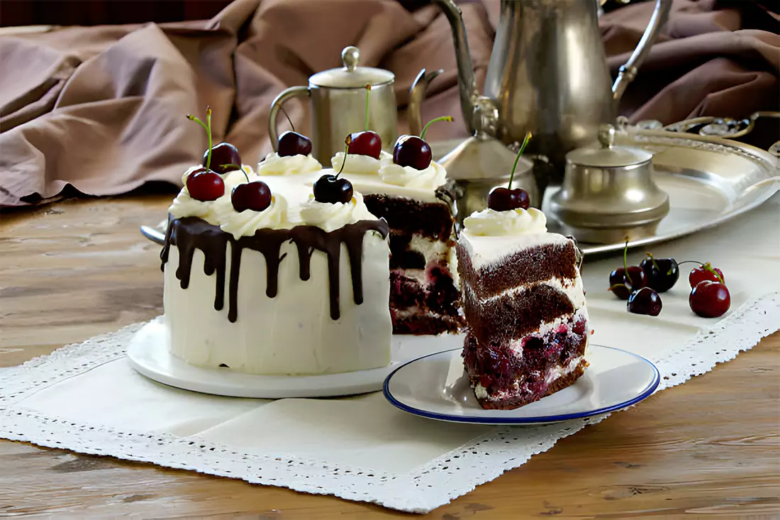 A beautifully finished Maraschino Cherry Cake ready to be served