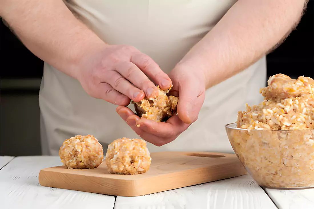 Step-by-step preparation of Rice Krispie Peanut Butter Balls in the kitchen