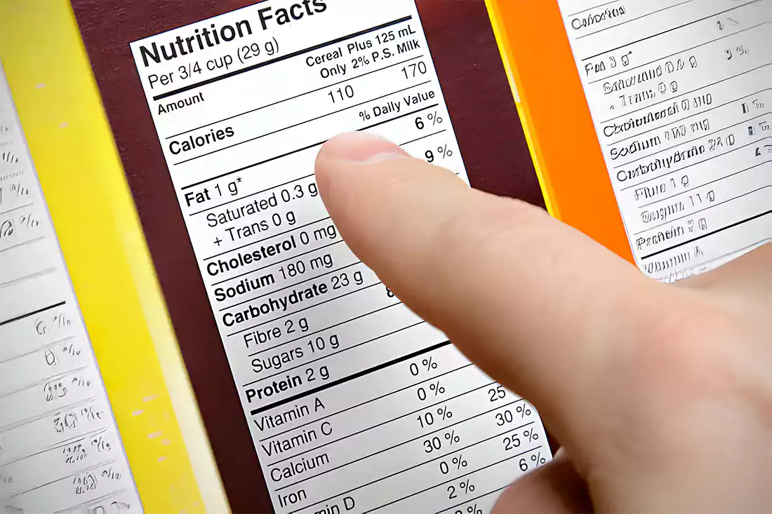 Close-up of a cereal box's nutrition facts label, emphasizing the sugar content and nutritional aspects of cereals like Cinnamon Toast Crunch.