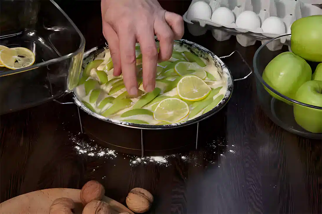 The process of baking a Key Lime Pie, showcasing the crust preparation and filling mixing.