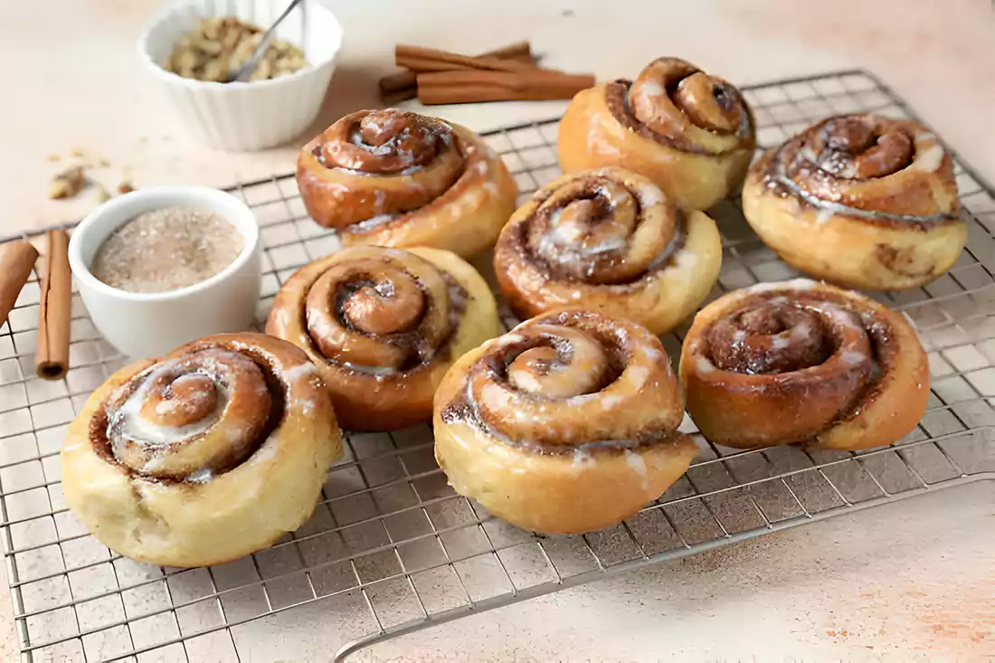 Freshly baked loaf of cinnamon bread, showcasing the perfect texture and swirls of cinnamon