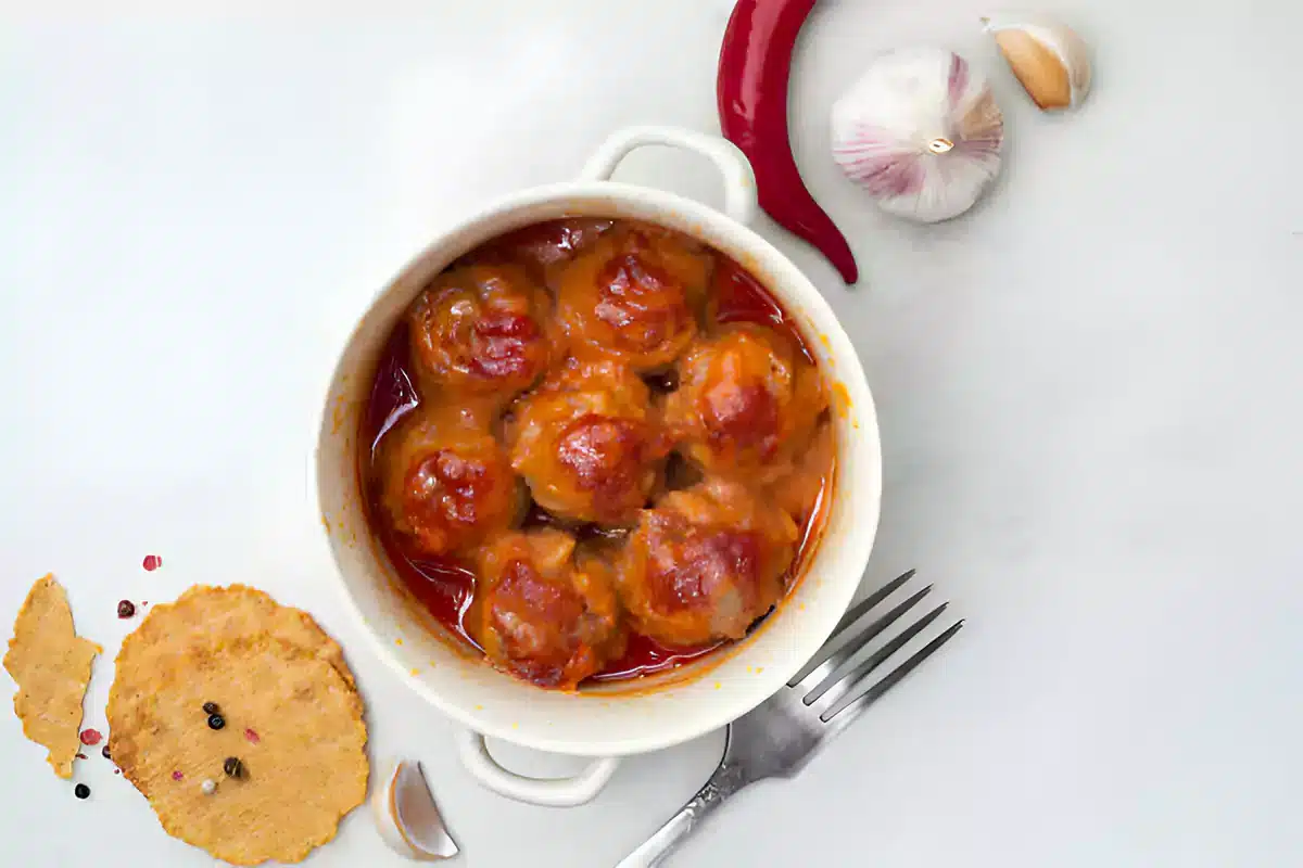 Ingredients for porcupine meatballs and tomato soup laid out on a kitchen counter